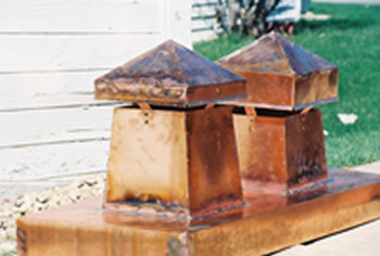 Custom copper chimney cap and sheet metal work