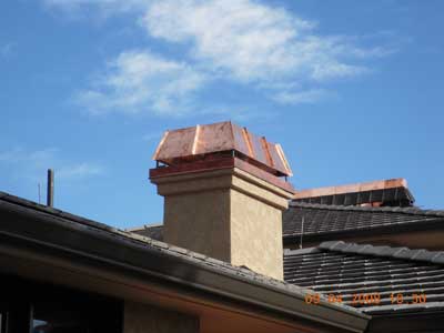 Custom chimney cap on Denver home