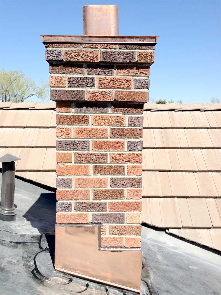 Copper chimney cap installed